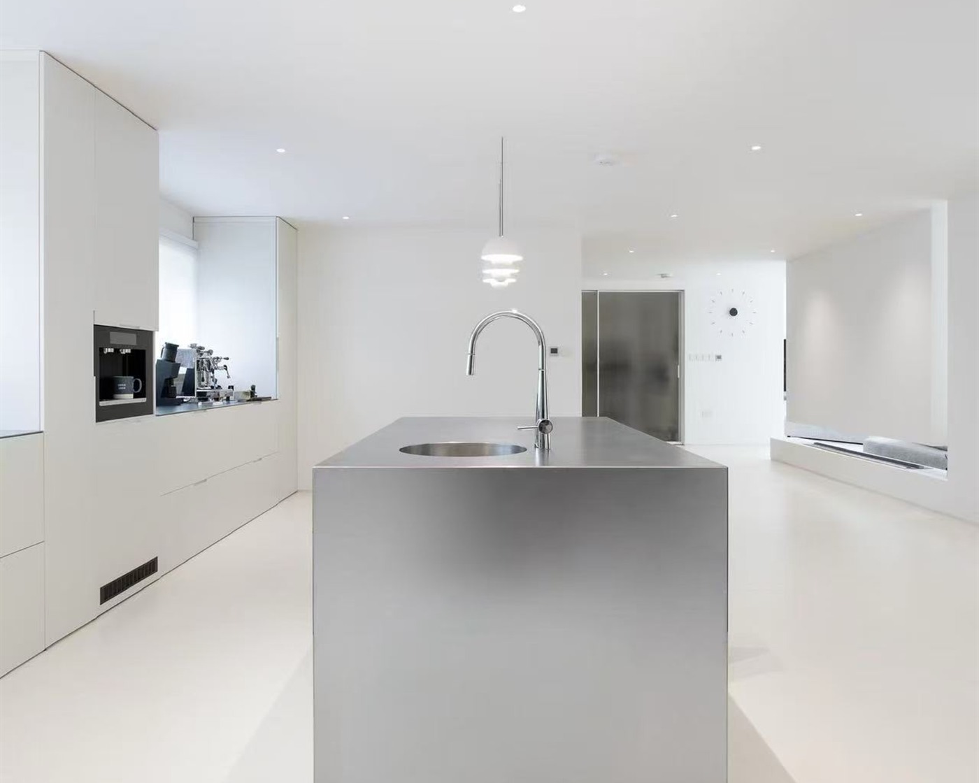 London residence kitchen island with integrated appliances