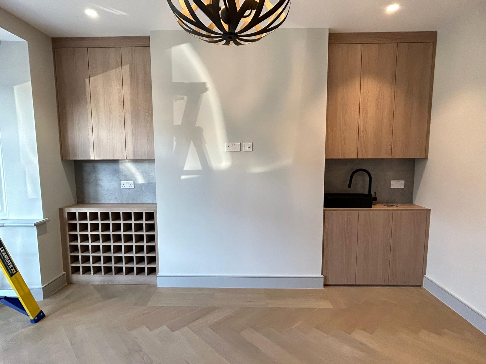 Built-in bar and wine storage with fitted cabinetry