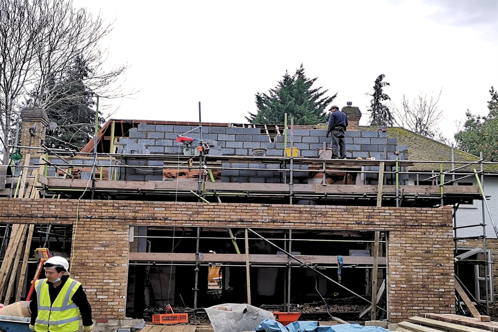 Sylvan new-build under construction with masonry and upper wall structure